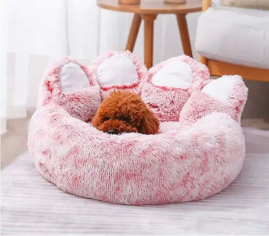 Coussin en forme de patte pour chien